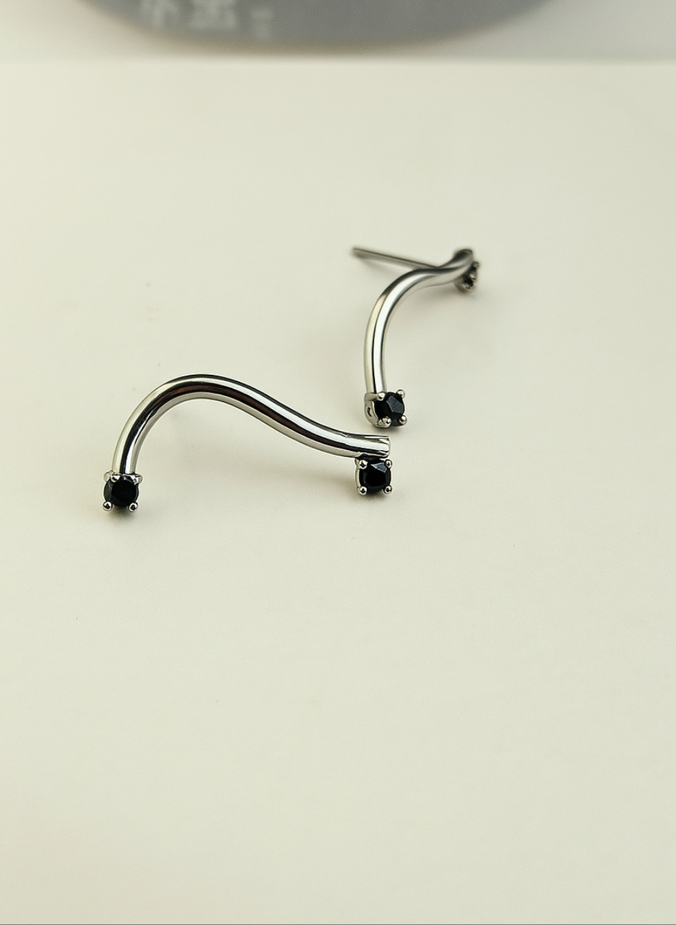 Curved Silver-Plated Earrings with Black Zircons – Modern Minimalism