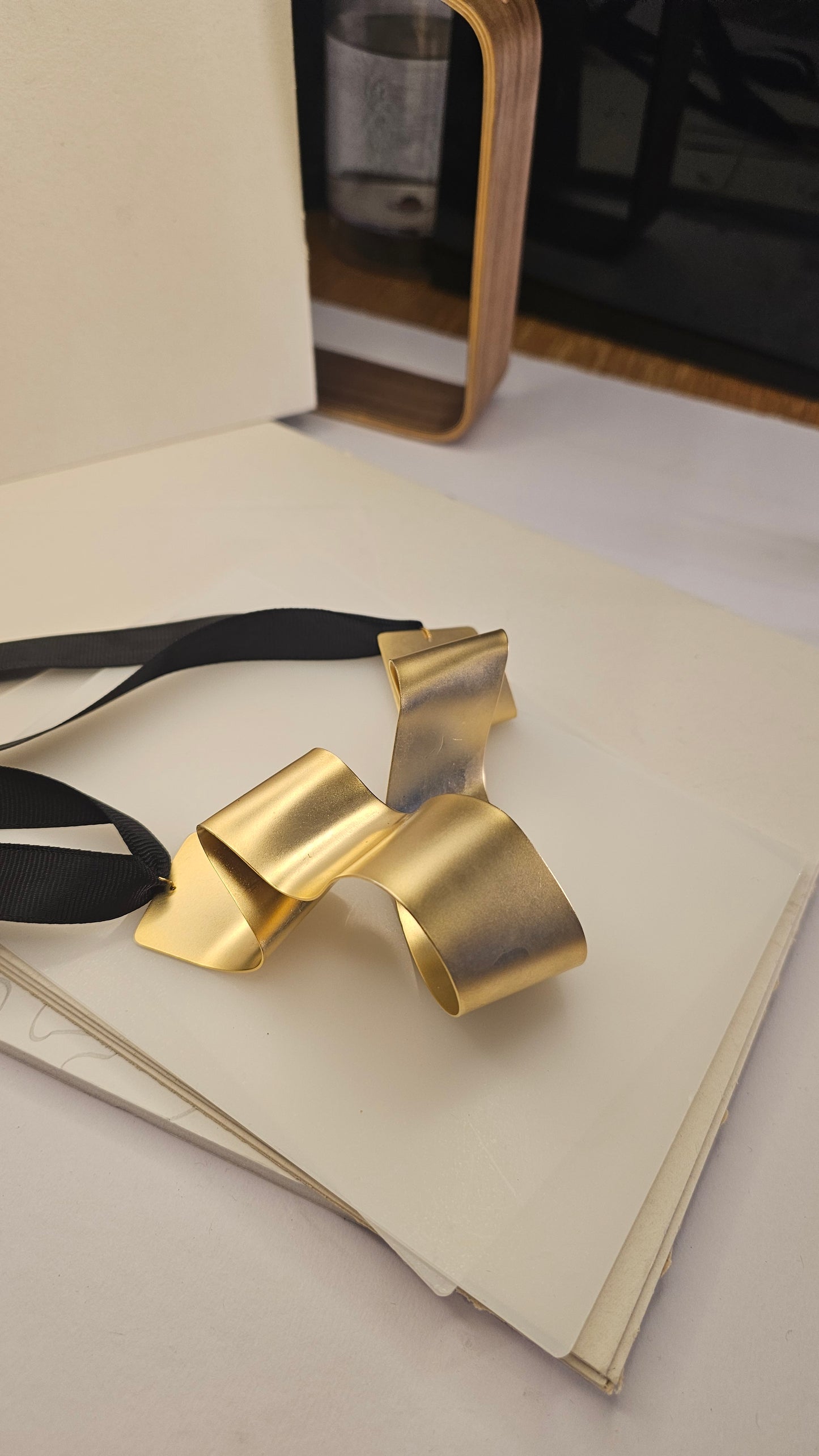 Sculptural Gold-Plated Ribbon Necklace – Bold & Artistic - made by order