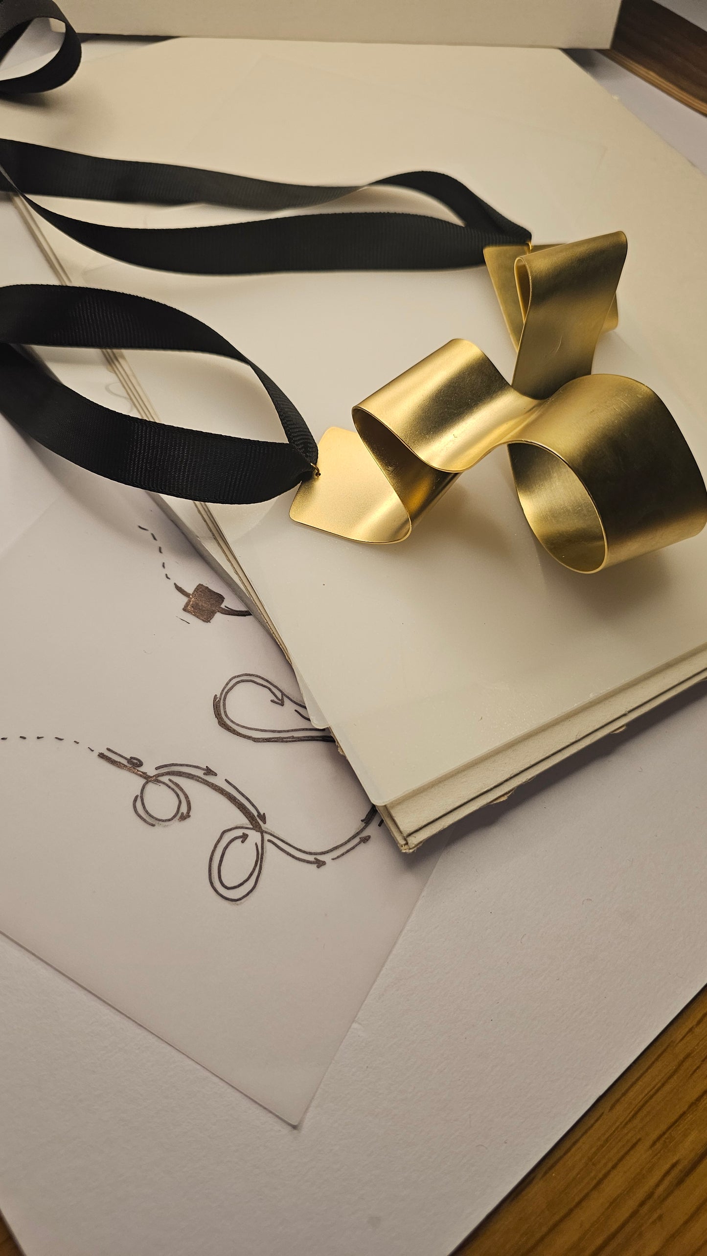 Sculptural Gold-Plated Ribbon Necklace – Bold & Artistic - made by order