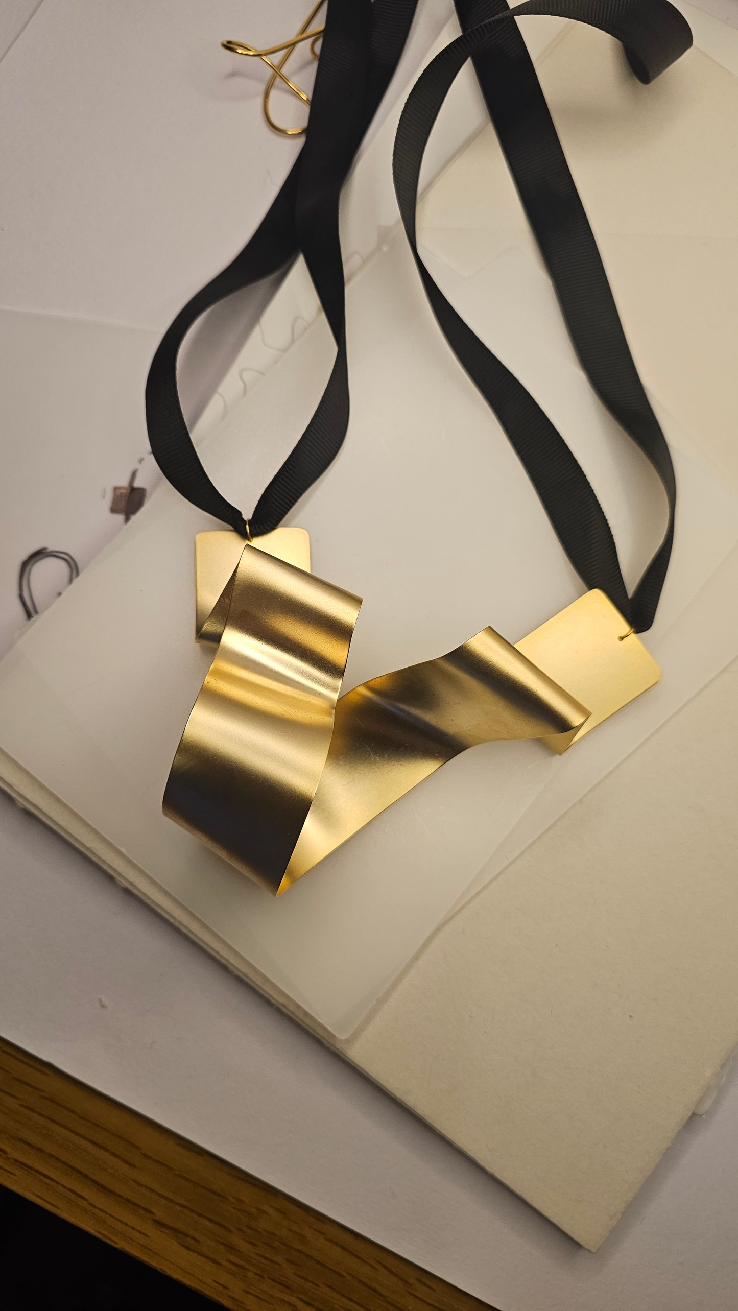 Sculptural Gold-Plated Ribbon Necklace – Bold & Artistic - made by order