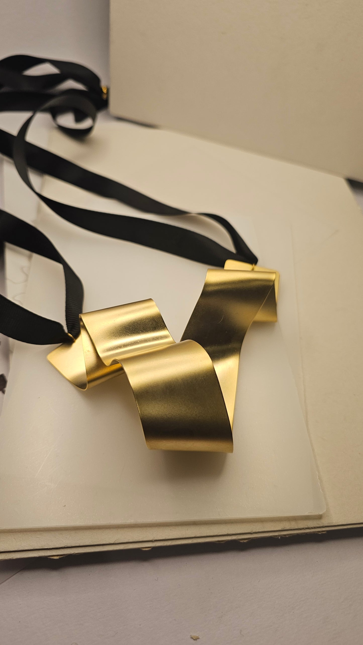 Sculptural Gold-Plated Ribbon Necklace – Bold & Artistic - made by order