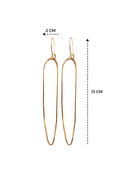a pair of gold earrings with measurements