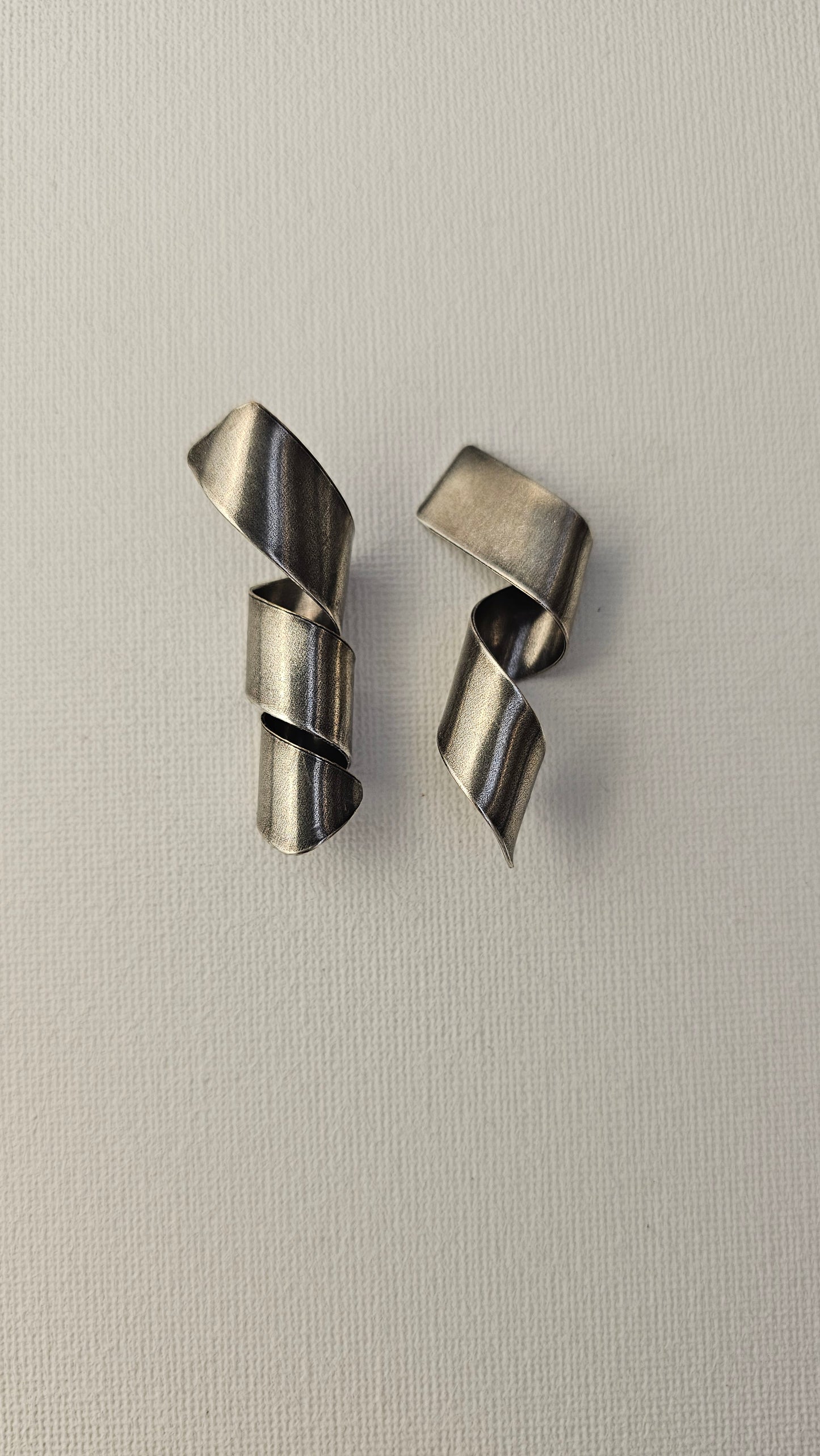 Curly silver tone Earrings