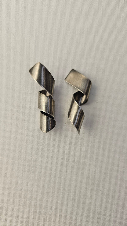 Curly silver tone Earrings