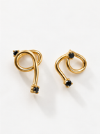 Figaro Earrings (FGR-2601), handmade asymmetric gold-plated earrings with black stones by OTILYAS, front view
