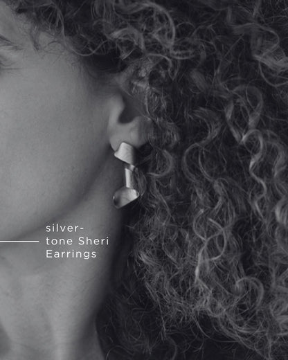 Curly silver tone Earrings