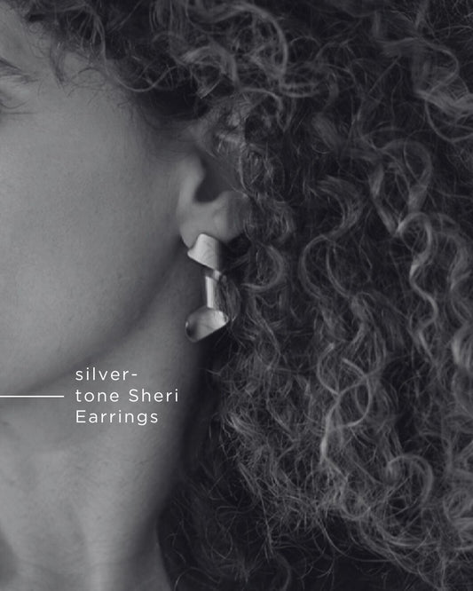 Curly silver tone Earrings