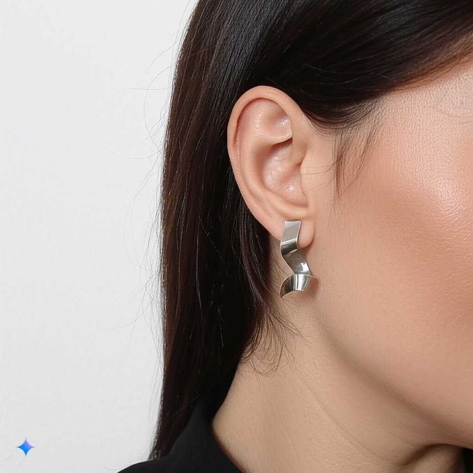 silver tone Sculptural Twist Earrings