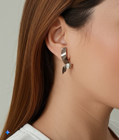 silver tone Sculptural Twist Earrings