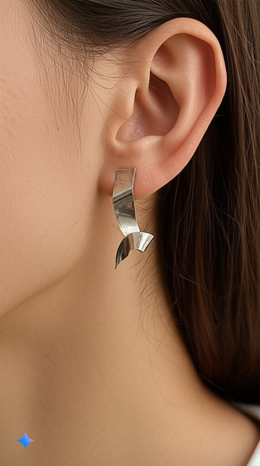 silver tone Sculptural Twist Earrings