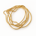 OTILYAS Hurricane Nº 8924, set of 5 gold-plated brass bracelets, one of a kind, top view on white