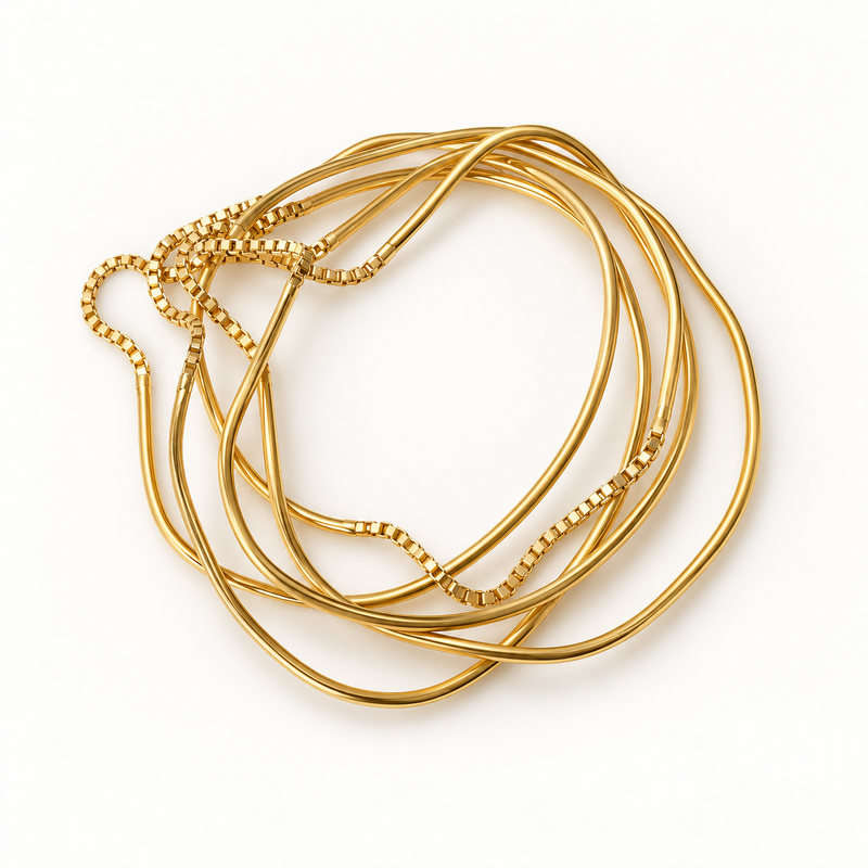 OTILYAS Hurricane Nº 8924, set of 5 gold-plated brass bracelets, one of a kind, top view on white
