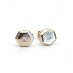Little Studs in white gold, two faceted hexagon studs, each with a small natural diamond set in the centre