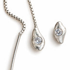 OTILYAS Birth Earrings (A) Nº 3447, one of a kind, detail on white