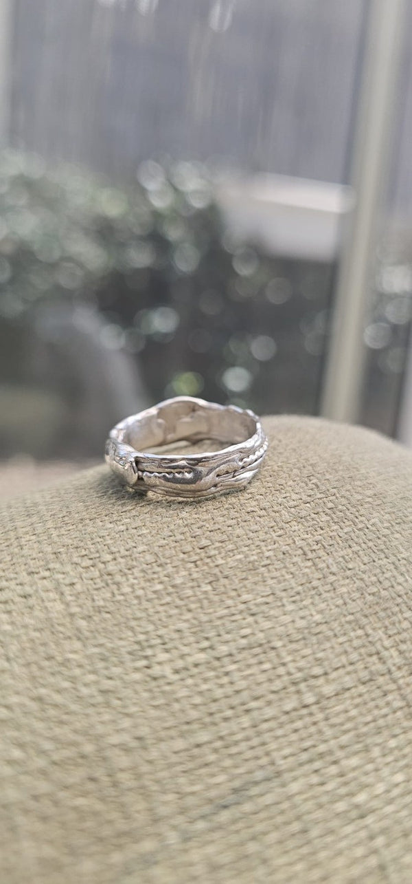 The Carmel ring resting on linen in the OTILYAS studio