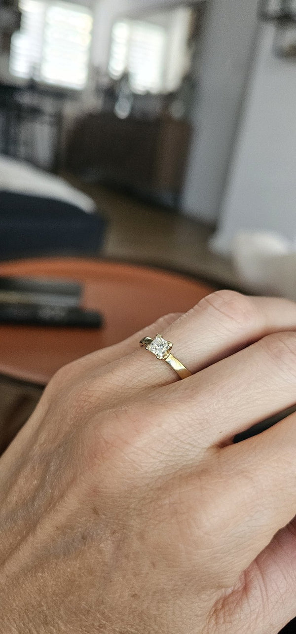 The Sun Square Ring worn on the hand in the OTILYAS studio