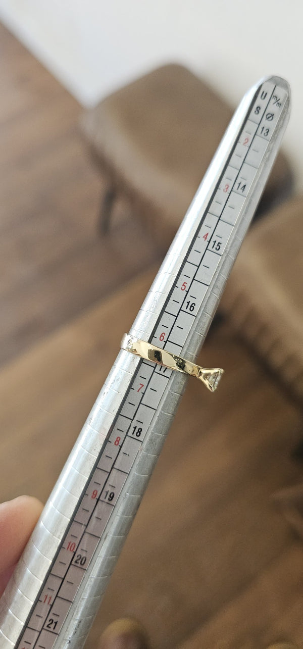 The Sun Square Ring in the OTILYAS studio, on the ring sizer