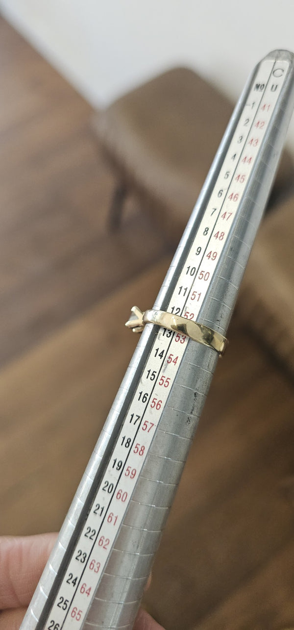 The Sun Square Ring in the OTILYAS studio, on the ring sizer