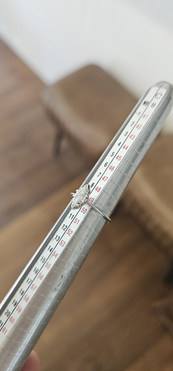 The White Leaf Ring in the OTILYAS studio, on the ring sizer