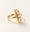 The Three Lights ring, 14k yellow gold, soft three-quarter view