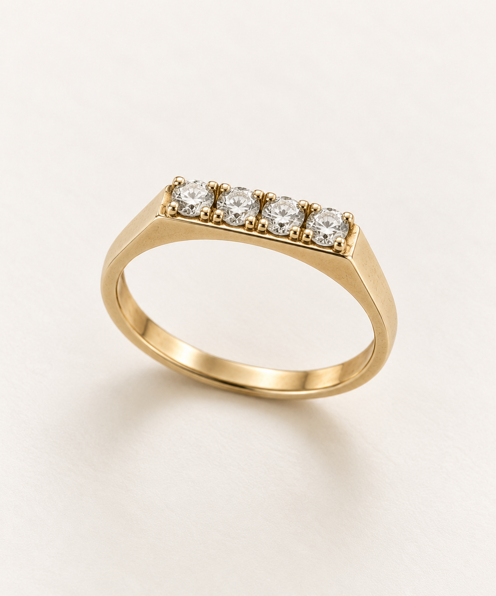 The Quartet ring, 14k yellow gold, standing three-quarter view