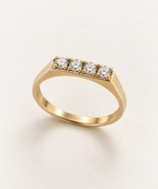 The Quartet ring, 14k yellow gold, standing three-quarter view