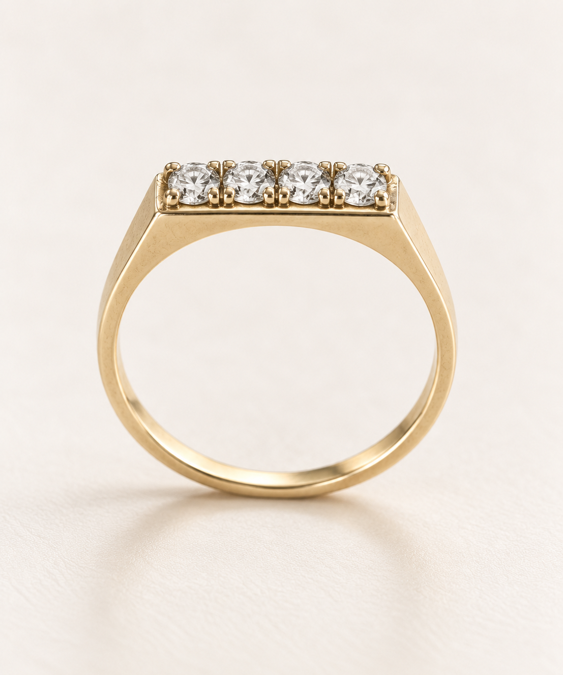The Quartet ring, 14k yellow gold, standing profile view