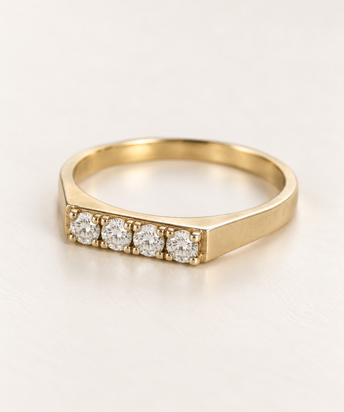 The Quartet ring, 14k yellow gold, soft side three-quarter view